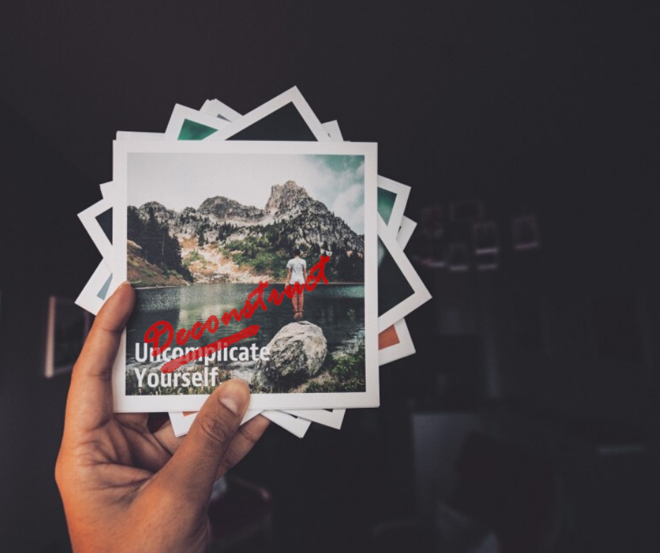 On activism, race and privilege. Picture of a hand holding a set of polaroid pictures, with the word "Deconstruct" written in red over the first one.